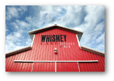 Whisky Cake logo on a barn